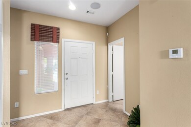 Entryway featuring visible vents and baseboards