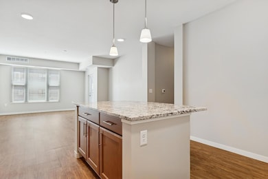 You'll love this functional center island / breakfast nook that has plenty of storage, too!