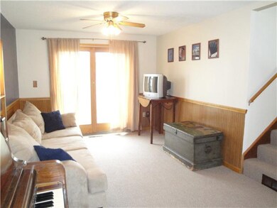Family Room. New Berber Carpeting Just Installed. 
