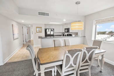 Dining area featuring sink