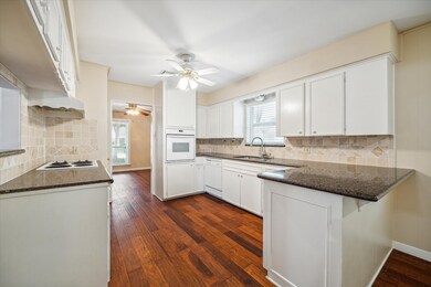 12130 Queensbury Ln, Houston, TX 77024 - photo 7