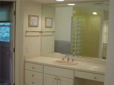 There's 2 separate vanities...his and hers in master bath.  Large walk in shower and luxury jetted tub.
