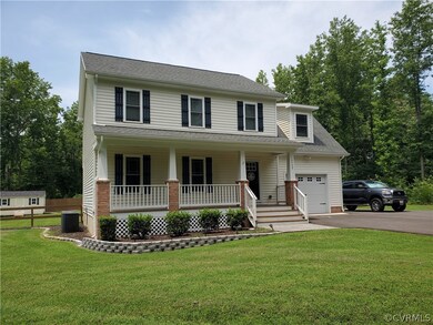 Photos show the same floor plan built by McLaughlin Homes.