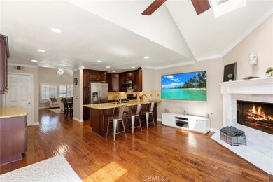 Open floor plan with kitchen that opens to family room. Wait until you see the fireplace.