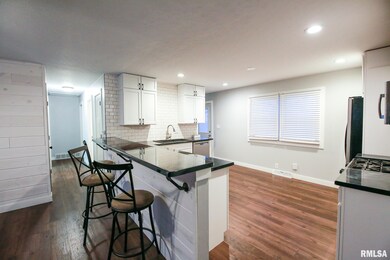 1721 W 69th St, Davenport, IA 52806 - photo 2