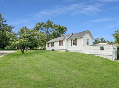 South view via circle drive