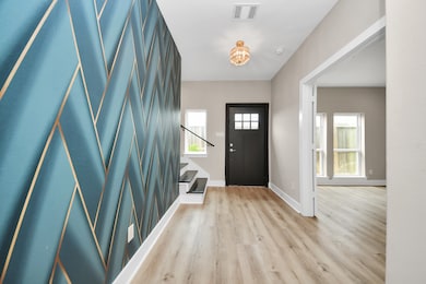 This entryway features a striking geometric accent