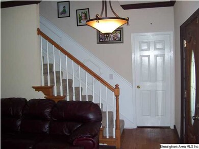 Inviting foyer area with hardwoods