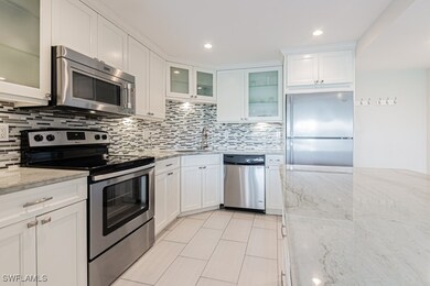 Kitchen with appliances with stainless steel finis