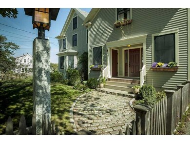 Exterior Front. A cobbled walkway...