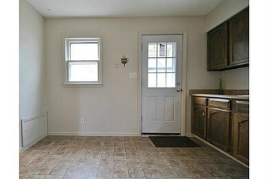 Kitchen. Lots of cabinets and space in this large 
