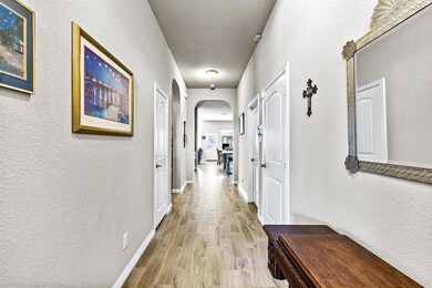 Hallway leading from Front door into OPEN Concept 