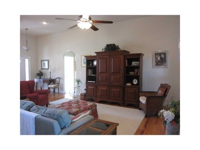 Living Room. Real hardwood floors, large living room with gas log fireplace
