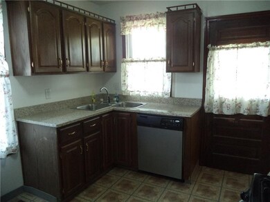 Double sink plus dishwasher, PLUS more granite and