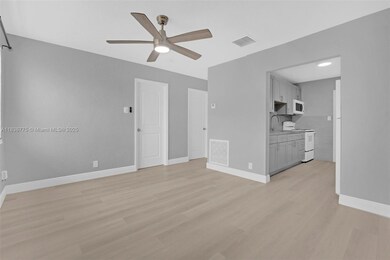 369 Phippen Waiters Rd unit 2, Dania, FL 33004 - photo 4