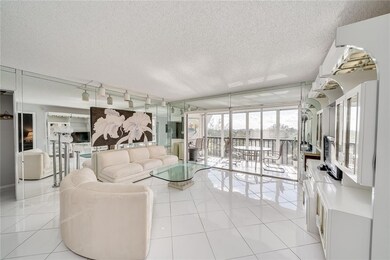 LIVING ROOM AND BALCONY
