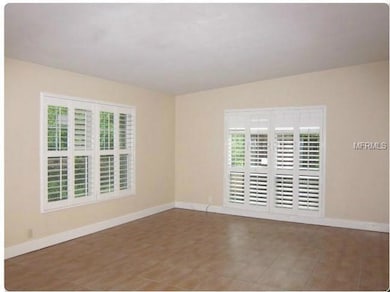 Living Room - Shutters, vaulted ceilings,