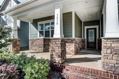 Covered Front Porch with Stone Accents