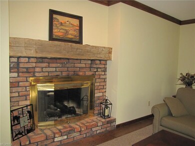 Warm gas log fireplace in the spacious great room.