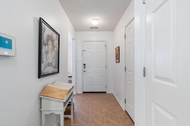 Entryway featuring a textured ceiling
