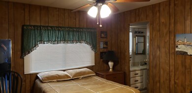 Guest Room with open door to bath