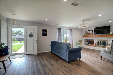 Living room with plenty of natural light, dark har