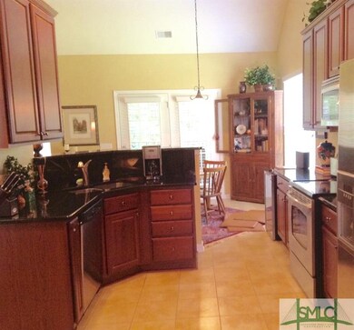 Kitchen view overlooking sunny, charming breakfast