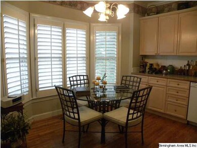 Large breakfast nook with even more cabinets and s