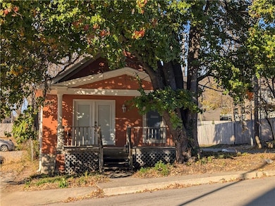 Bungalow-style house with covered porch