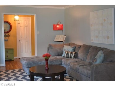 Living Room - Hardwood floors and a huge picture w