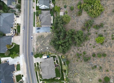 View of property location with nearby suburban area