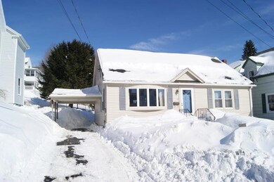 Carport and back entrance to the...