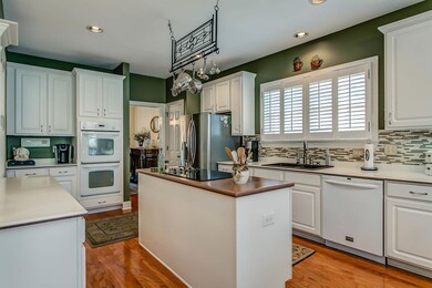 You will love this huge kitchen with white cabnets.