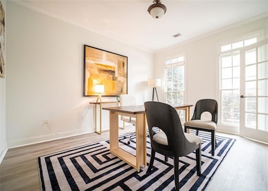 Office space with wood finished floors, ornamental