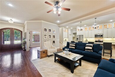 The heart of the home is perfect with kitchen, living, & dining spaces open, ideal for families and entertaining.