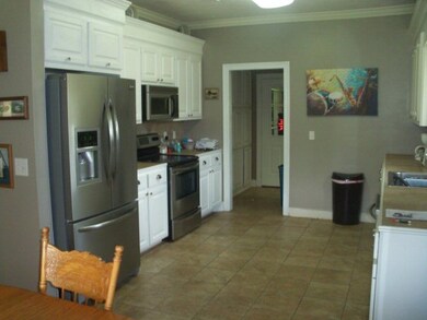 Kitchen, door to UR