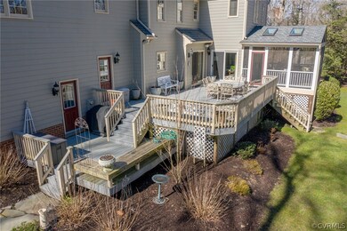 Two tiered composit deck with built-in seating. Th