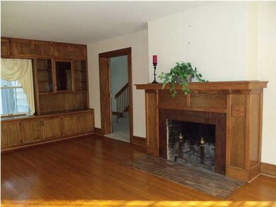 Living room with fireplace and built-ins