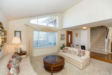 Formal Living Room with Leaded Glass above Window-