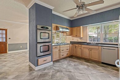 Large kitchen and dining room.