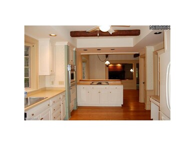 Kitchen with views to informal dining area.  Hardw