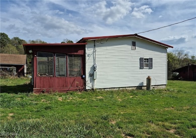 9256 Blossom Rd NE unit 15, Mechanicstown, OH 44651 - photo 2