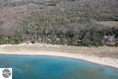 100 ft of sugar sand. 1.25 acres of land.