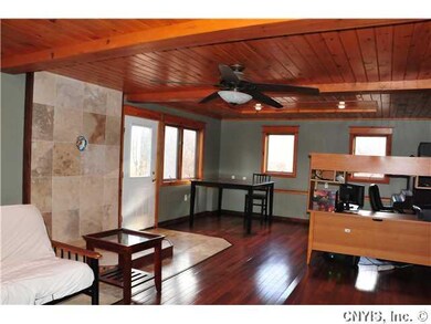 Exterior Front. Large lower level family room with