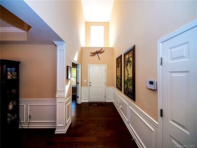 Custom trims await! Foyer area with office or flex space to the right as you enter.