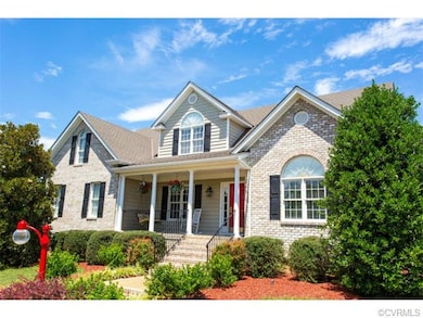 Beautiful partial brick front with low maintenance