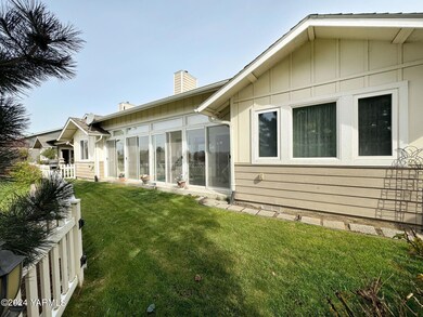 Back of Home with Sunroom