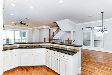 Easily entertain from the kitchen with an abundance of natural light in this massive open, comfortable space.