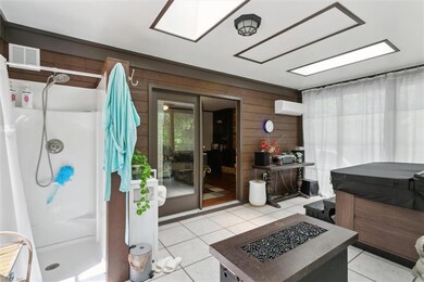 The sunroom has its own shower!