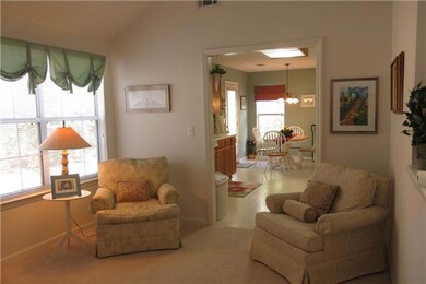 Currently used as sitting area for reading but could be office,separate den or formal dining room. 